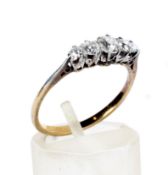 A vintage gold and diamond five stone ring.