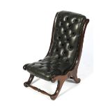 A contemporary leatherette button back 19th century style slipper chair with scrolled supports