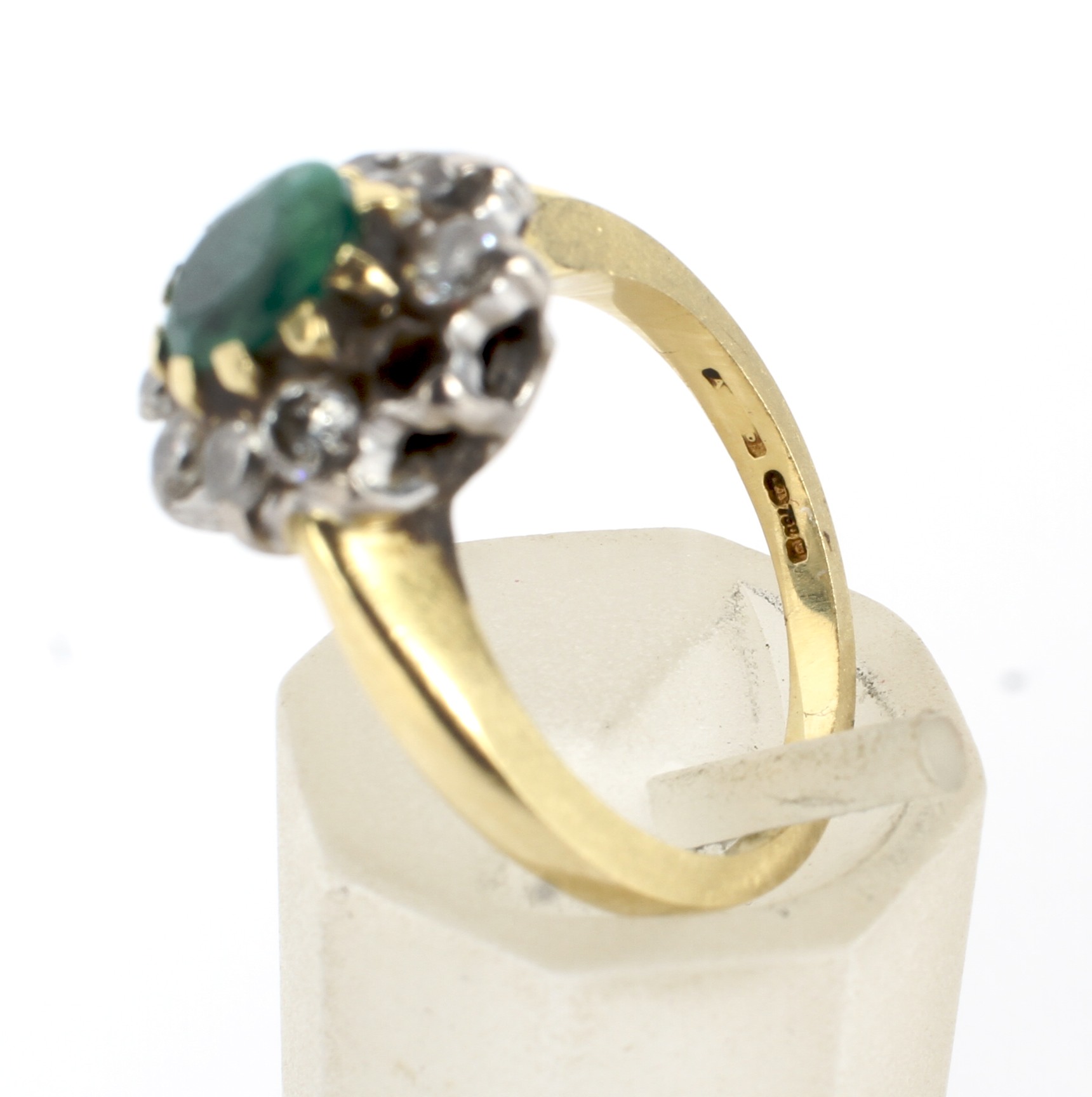 A modern 18ct gold, emerald and diamond oval cluster ring. - Image 4 of 4