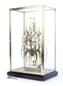 A large contemporary Great Wheel brass skeleton clock.