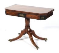 A Regency rosewood and mahogany fold over revolving card table.