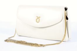 A Launer of London cream leather clutch bag.