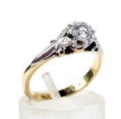 A vintage gold and diamond solitaire ring.