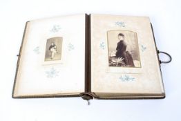 A Victorian leather bound photo album titled Porcelain, Pottery and Portraits.