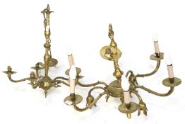 Two 20th century brass chandeliers.
