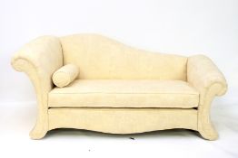 A contemporary chaise longue and matching sofa.