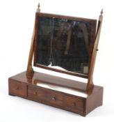 A Georgian mahogany swing mirror with th