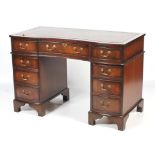 A Georgian style mahogany desk. The serp