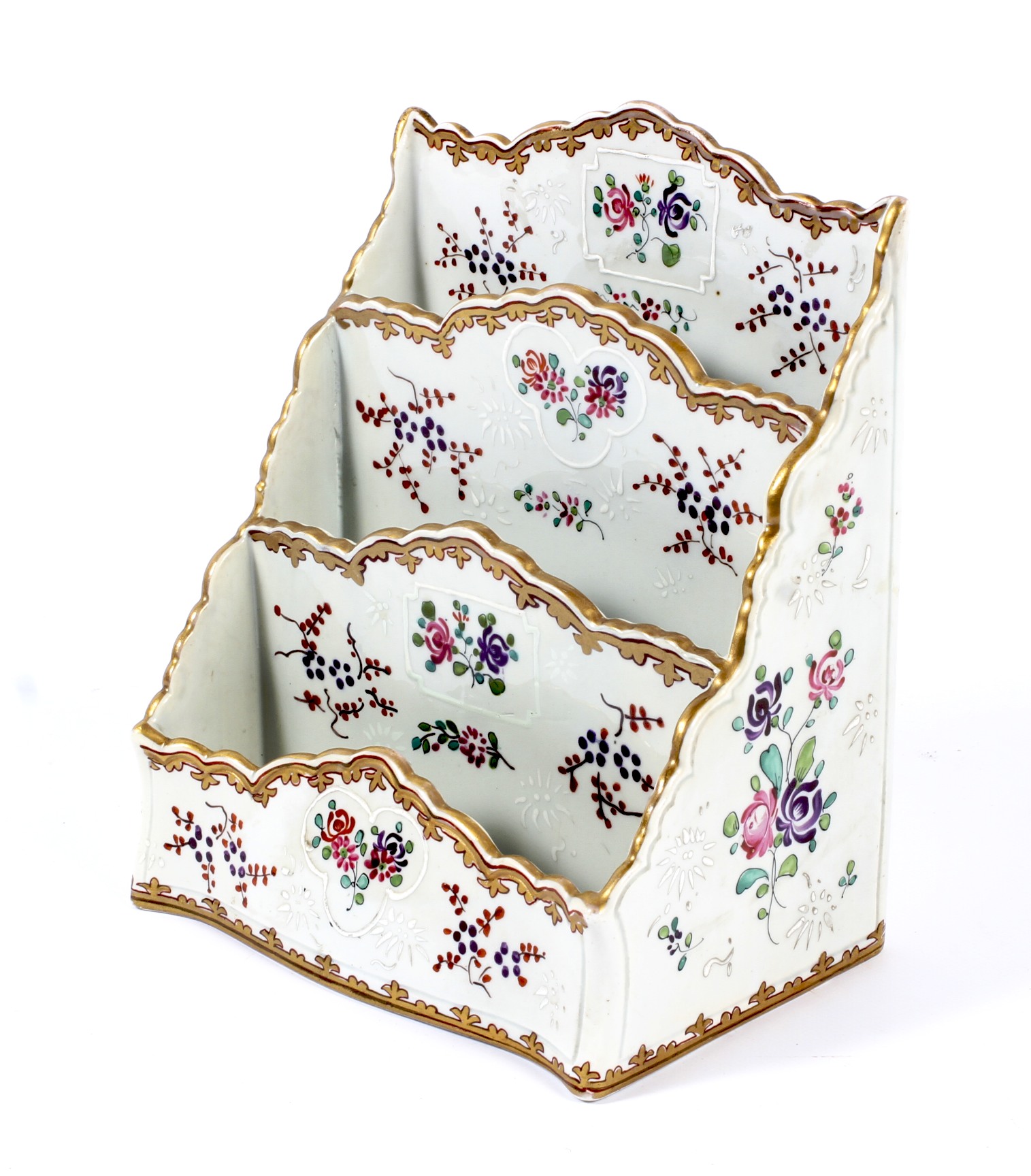 A four section Continental porcelain stepped letter rack.