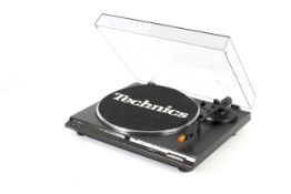 A Technics turntable SL-BD20, s/n GF4HC20677. With clear plastic dust cover, L43.
