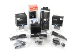 Various GoPro accessories in original packaging.