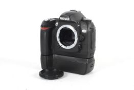 A Nikon D70 DSLR camera body.