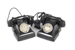 Two GPO 332F rotary black Bakelite telephones.