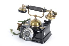 A Danish Kjobenhavns Telefon brass mounted cradle desk telephone.