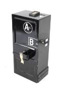 A replica A + B telephone coin collector strongbox with payment mechanism.