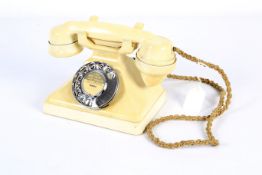 A GPO cream Bakelite rotary dial telephone 234.