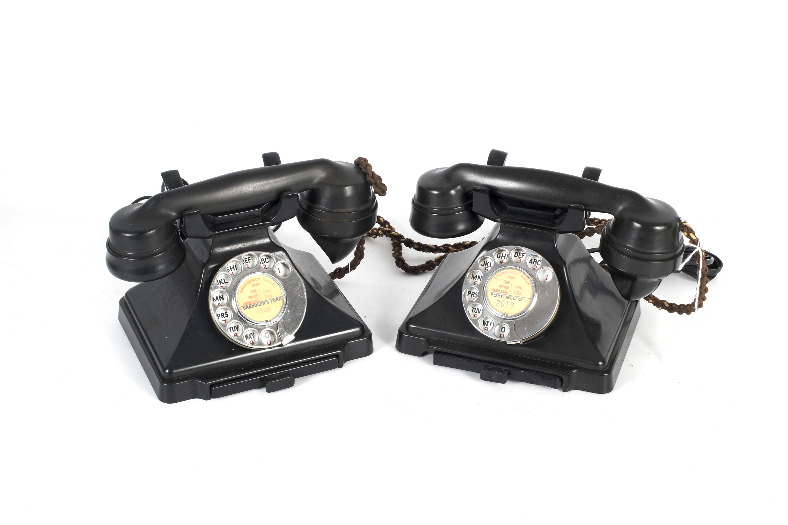 Two rotary pyramid black Bakelite 232 telephones with drawer.