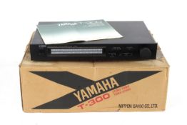 A Yamaha Stereo hi-fi separate tuner T-300.