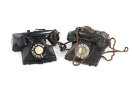 Two GPO rotary pyramid 1/232 F black Bakelite telephones with drawer.
