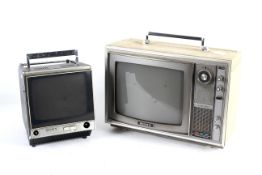 Two vintage SONY Solid State portable televisions.