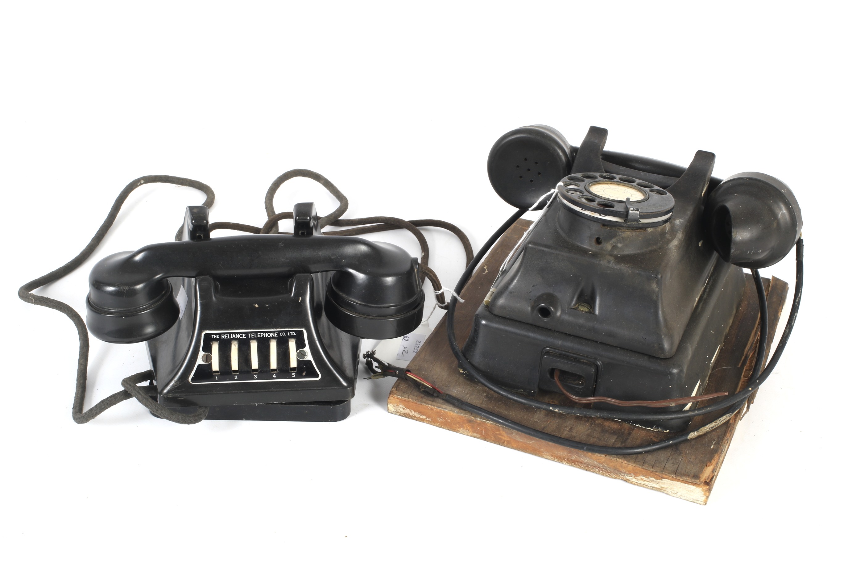 A circa 1940s black Bakelite GEC Reliance internal wall mounted telephone and another example