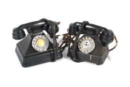 Two Siemens rotary black Bakelite telephones, model 328926. One with bellset.