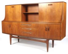 A 1960s G-Plan teak two-tier sideboard.