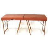 A vintage portable folding massage table