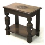 A Jacobean style oak hall table with sin