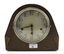 A 20th century oak cased mantel clock. T