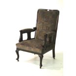An Edwardian upholstered mahogany open a