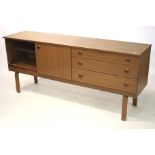 A 1960s teak veneered sideboard. With do