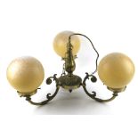 A vintage brass effect ceiling light. Th