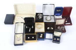 An assortment of boxed silver and white