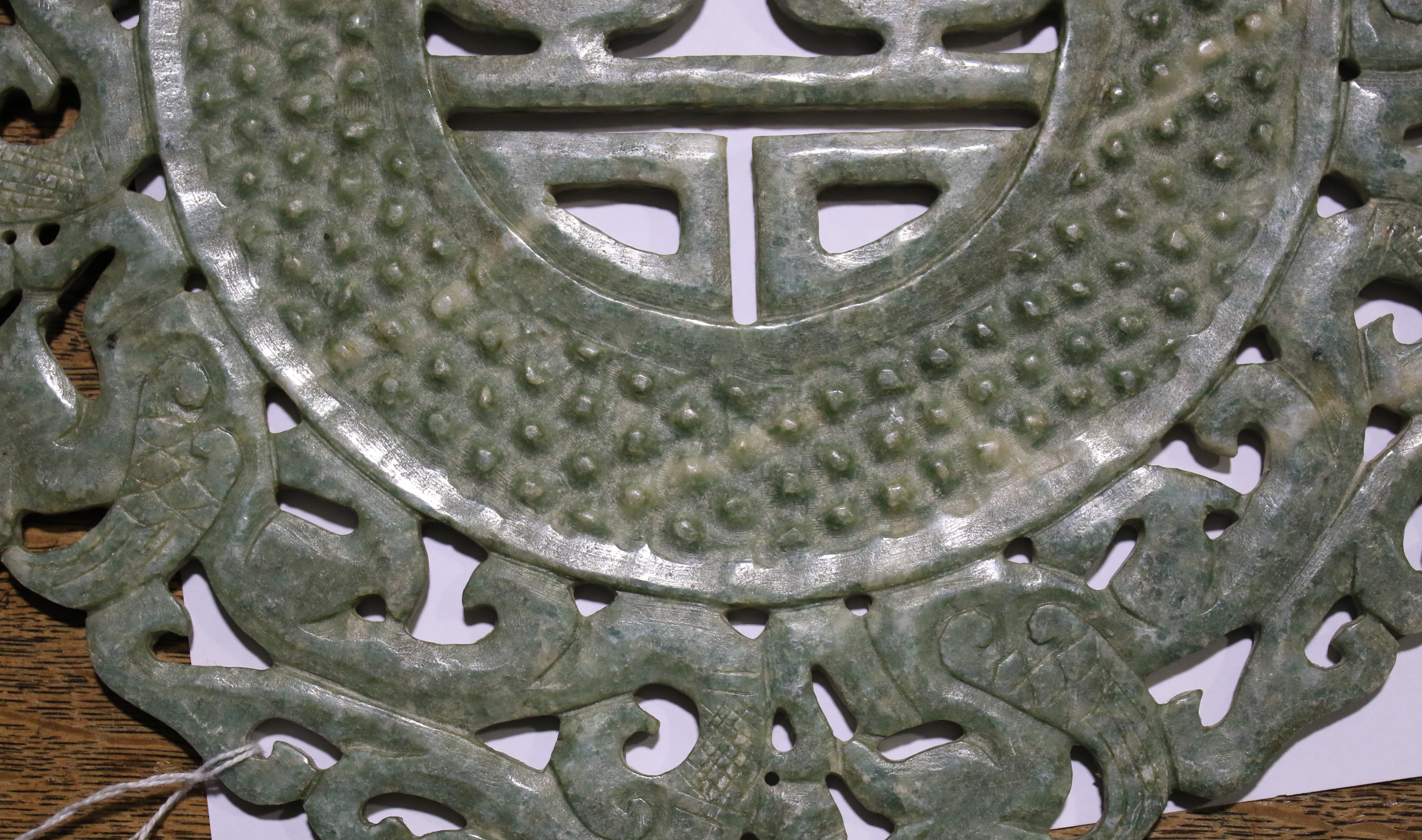 Two carved Chinese mottled green and whi - Image 5 of 12