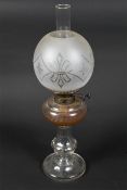 An Edwardian oil lamp. With domed froste