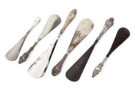 A collection of six silver and white metal handled shoe horns, 19th century and later.