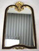 A large contemporary bevelled edge wall mirror.