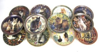 A set of twelve Danbury Mint plates from the 'Cats around the World' series.