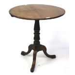 A 20th century mahogany occasional table.