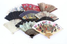 A collection of 9 assorted fans mostly Spanish tourists similar sizes L24cm