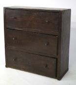A wooden country chest of drawers. Three long drawers with turned handles, L98cm x D41.