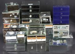 An assortment of mirrored jewellery boxes various sizes