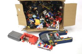 A comprehensive collection of loose Lego and diecast.