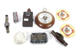 A mixed box of collectables including advertising, pocket knives, barometer and a watch etc.