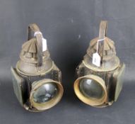 A pair of Eli Griffiths & Sons railway lamps.