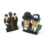 Two plaster models of Laurel and Hardy.