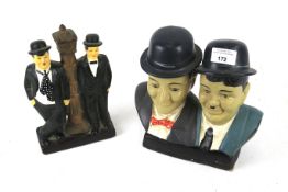 Two plaster models of Laurel and Hardy.