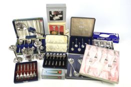 An assortment of vintage silver plate box sets of cutlery.