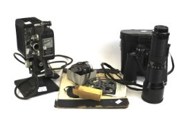 An assortment of camera equipment and electricals.